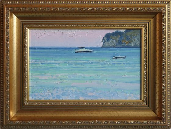 Sunset. Boats on the sea