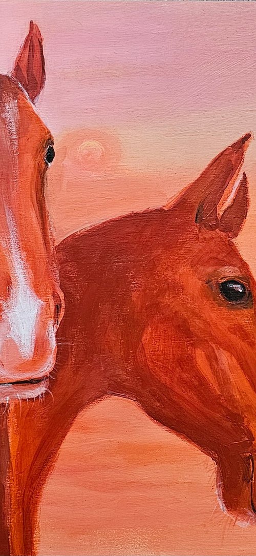 Chestnut horses at soft pink orange sunset by Ksenia June