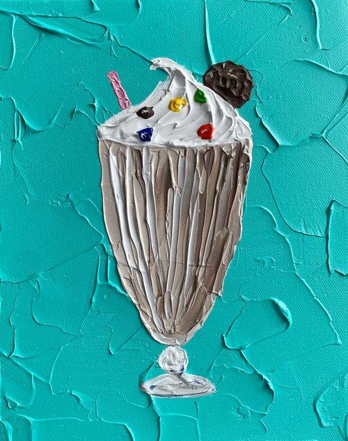 Chocolate milkshake on teal by Guzaliya Xavier