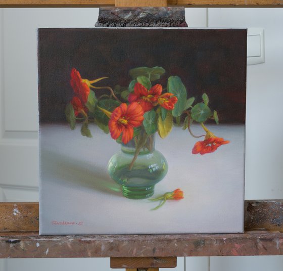 Nasturtiums in green vase