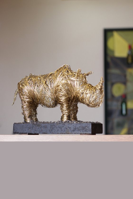 Golden rhino (20x30x12 2.9kg iron, brass, tufa)