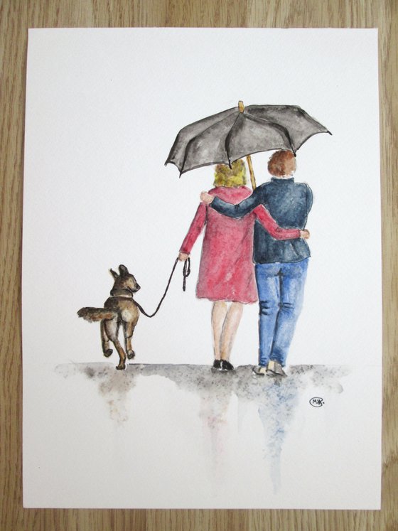 Couple walking the dog together