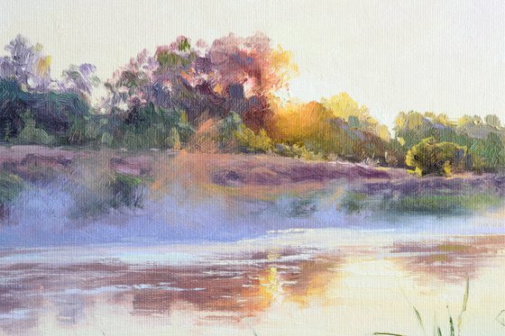 Warm sunrise over the water