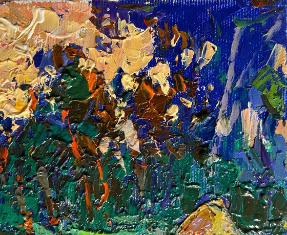 Yellow sunset behind tree