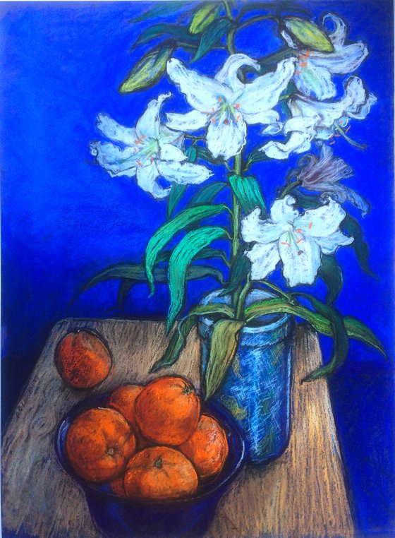 Lilly and oranges on a cobalt blue background