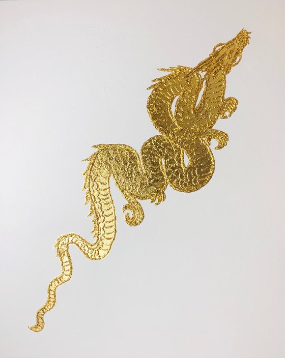 Golden dragon on white