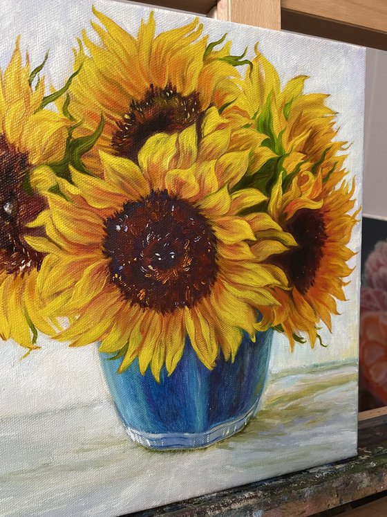 Sunflowers in a Blue Vase