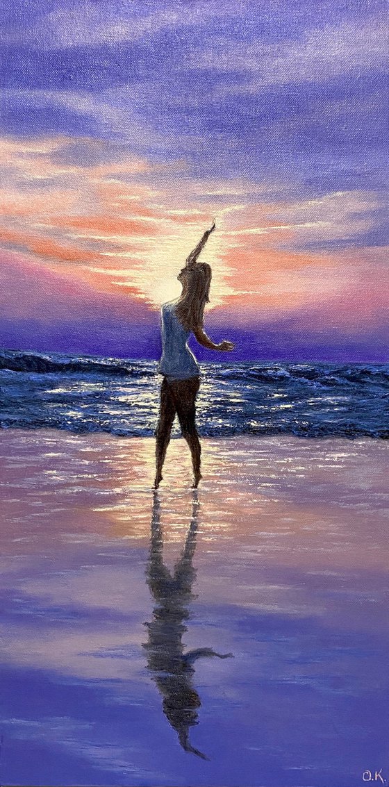 Girl in sunset reflection