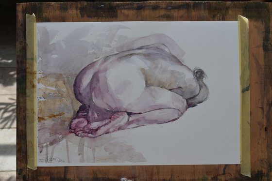 Curled up woman