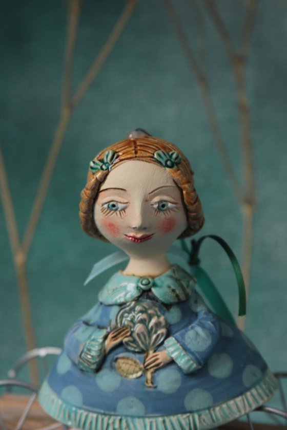 Little Girl in tender blue dress. Hanging sculpture, bell doll by Elya Yalonetski