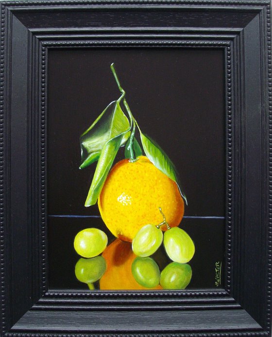 Orange with three grapes
