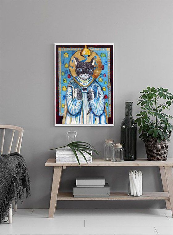 The cat god against a carpet.