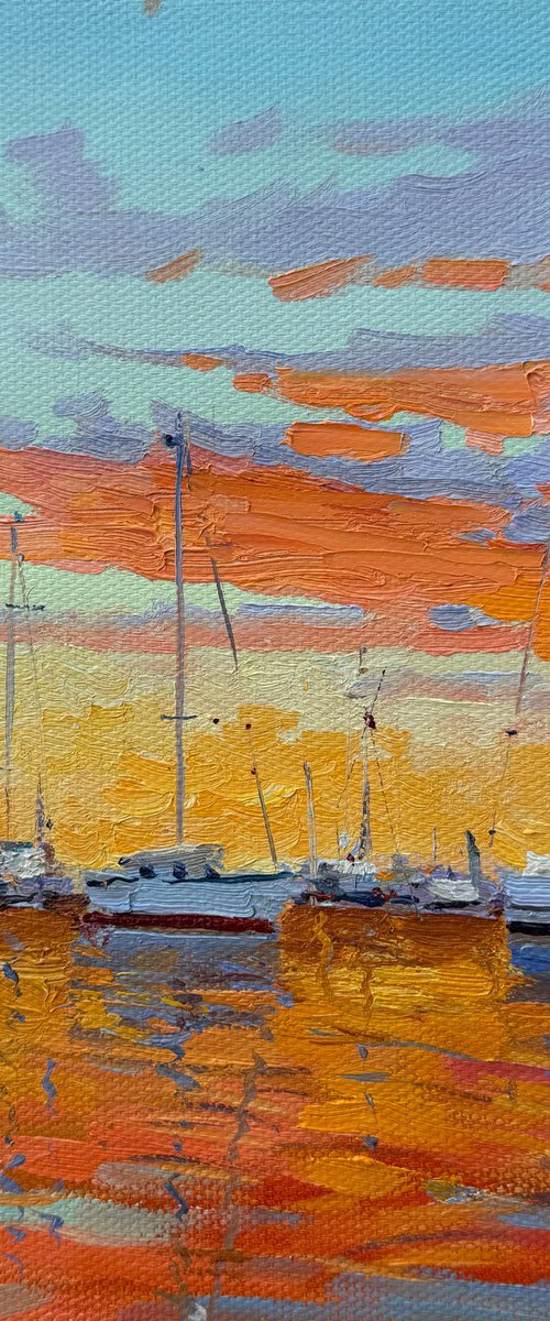 Sailboats at sunset by Evgeniia Mekhova