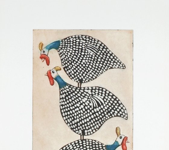 a stack of Guinea Hens