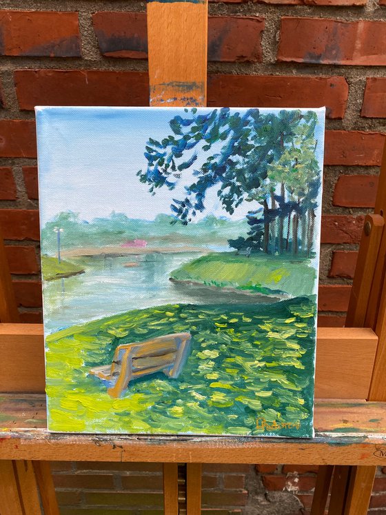 Sunny day at the lake in the park. Pleinair