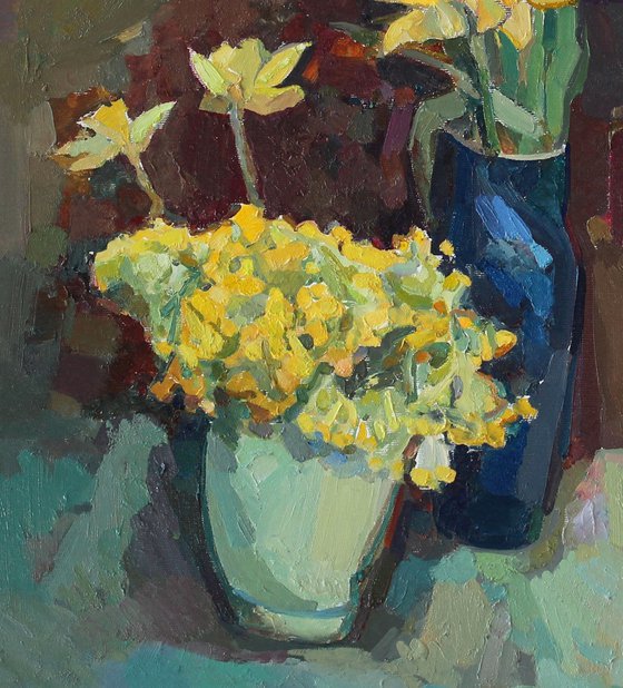 Yellow flowers with tulips