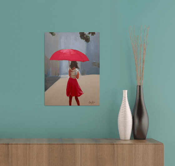 Girl with a red umbrella