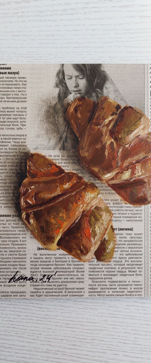 Croissants in the newspaper by Svitlana Brazhnikova