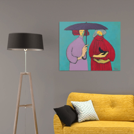 Two under an umbrella.