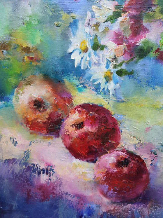 Red apples on blue