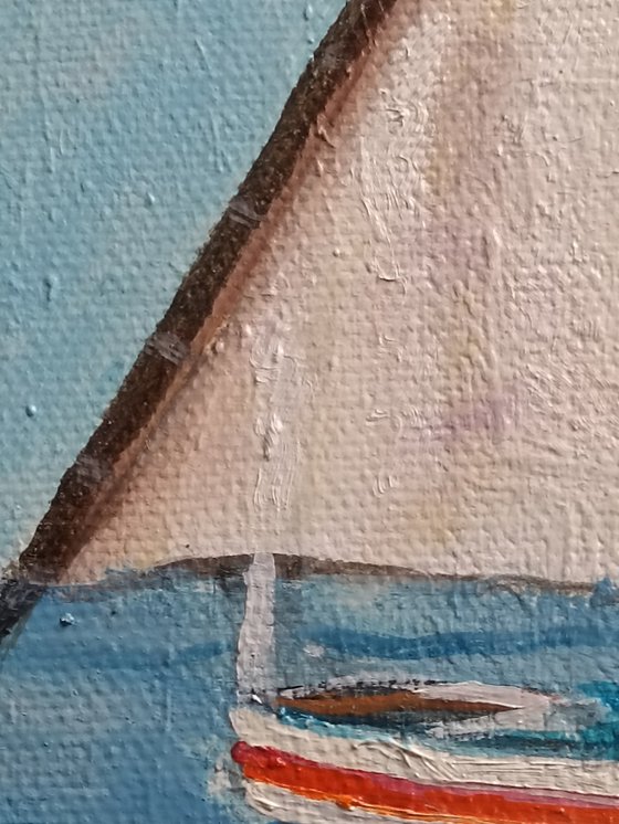 Boat, sea and reflections
