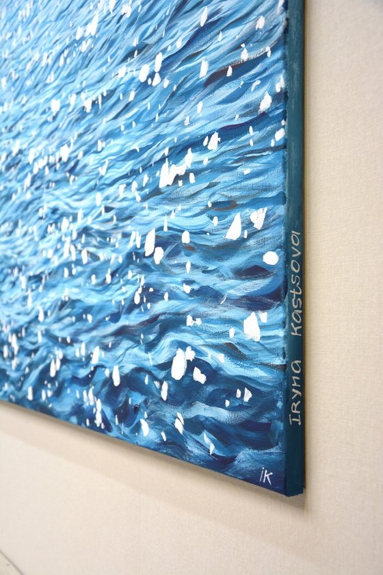 Glare on blue water.