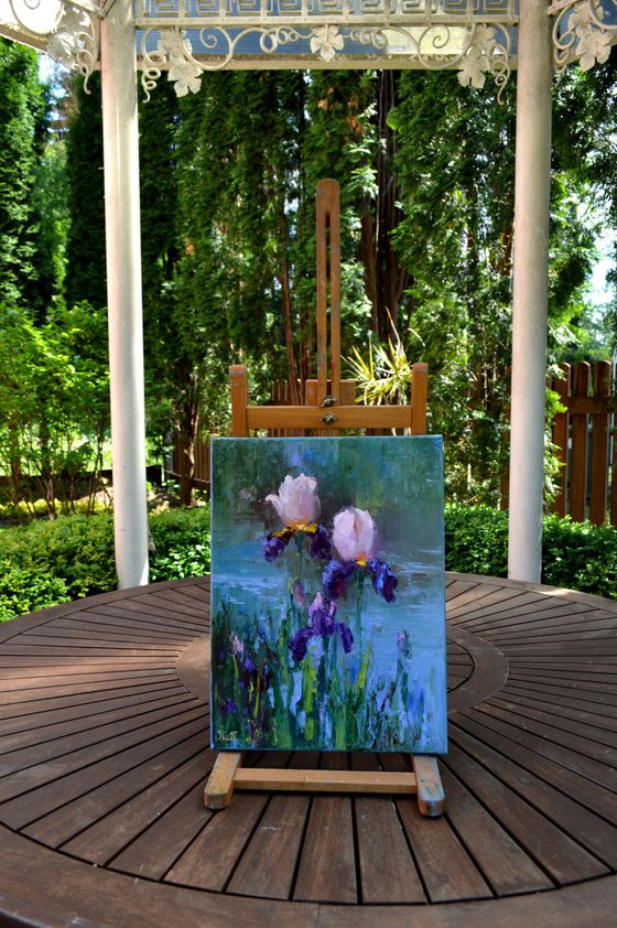 Three Irises by the pond