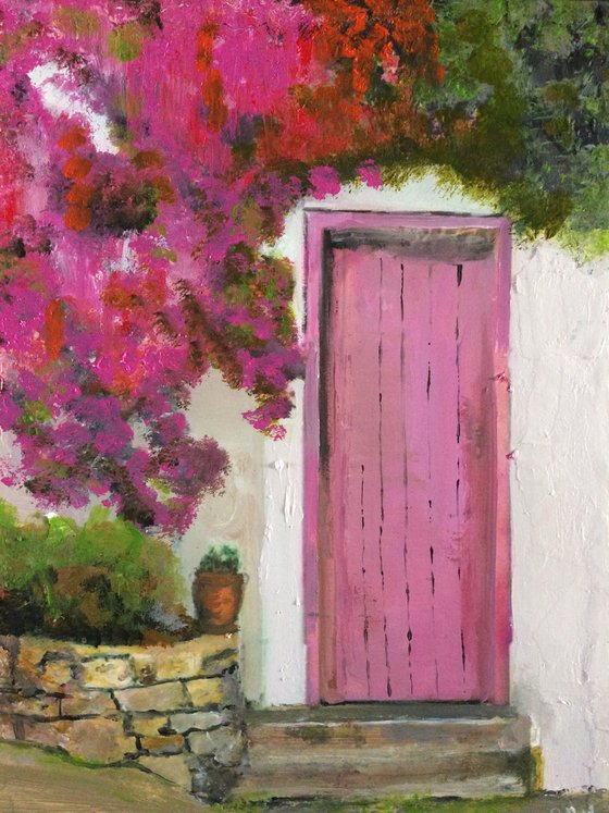 Mediterranean House with Pink Flowers