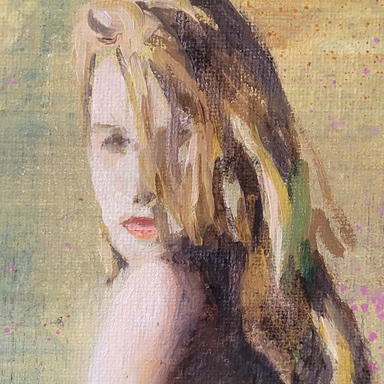 Blond Woman Sitting In The Sun