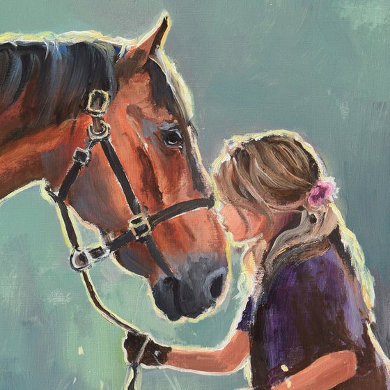 Girl kissing a brown horse