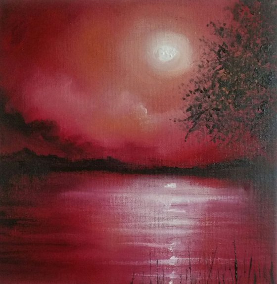 Red moonlit lake
