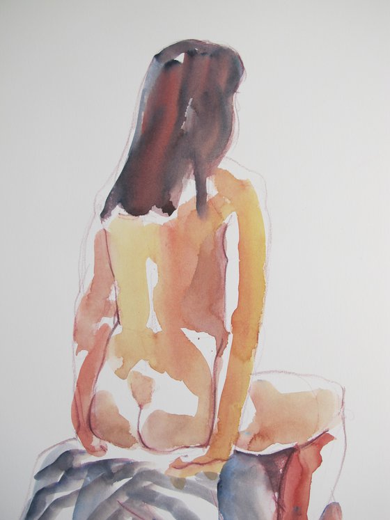 Seated female nude back view