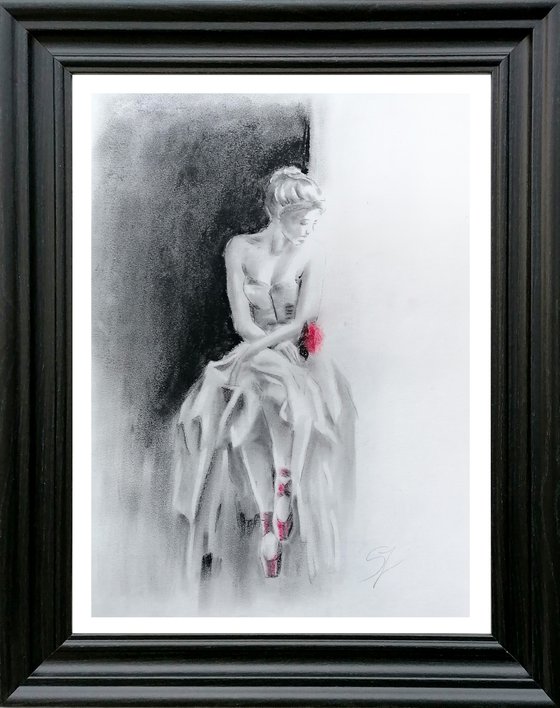 Ballerina with a red rose