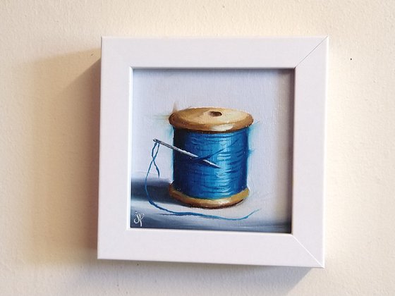 Little blue  cotton reel still life