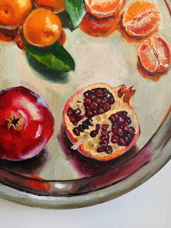 Pomegranates and tangerines