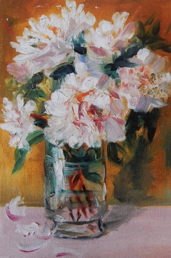 Peonies in a vase. Bouquet of the flowers.