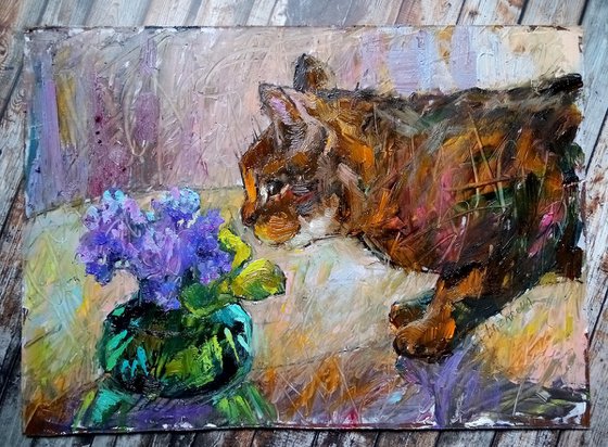 Cat and violets