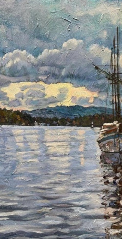 Autumn clouds over Aker brygge by Nadezda Stupina