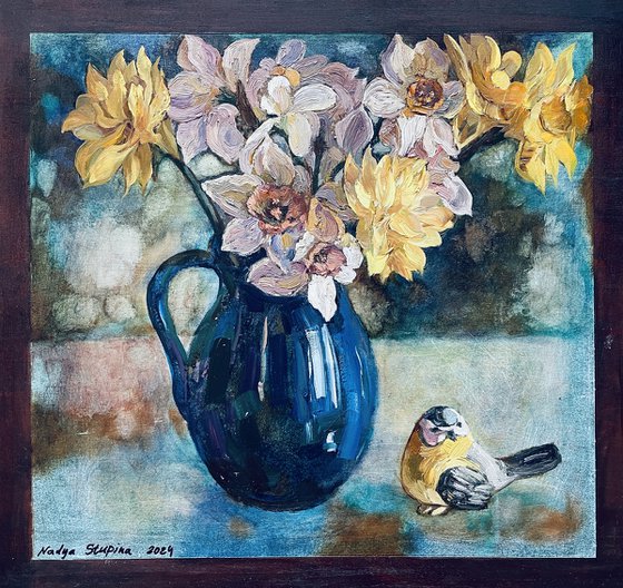 Daffodils in a blue vase