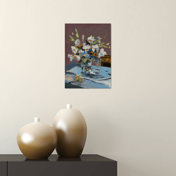 White flowers in a glass vase.