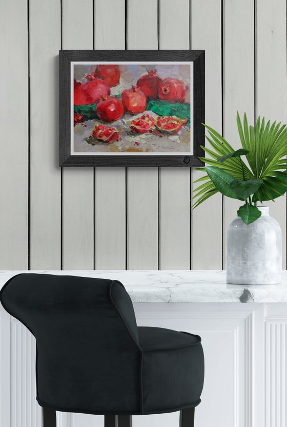 Pomegranate on grey