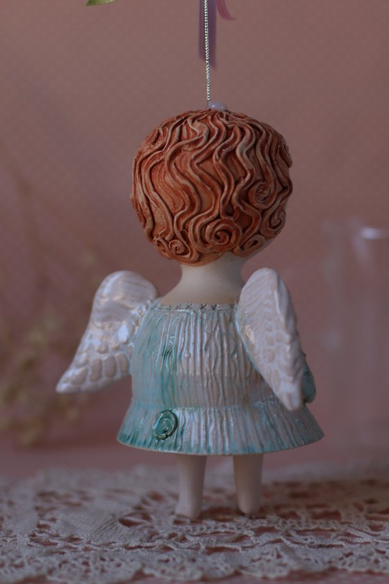 Tiny hanging sculpture. Angel