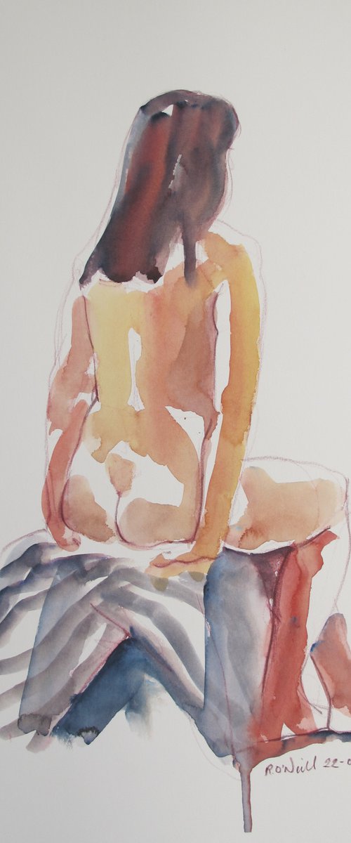 Seated female nude back view by Rory O’Neill