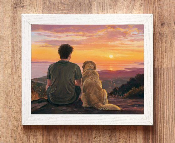 Boy sitting with a Golden Retriever dog