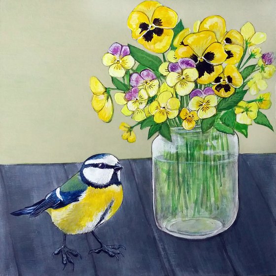 The blue tit and the pansies