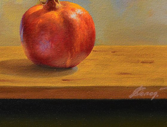 Still life with pomegranate and grapes