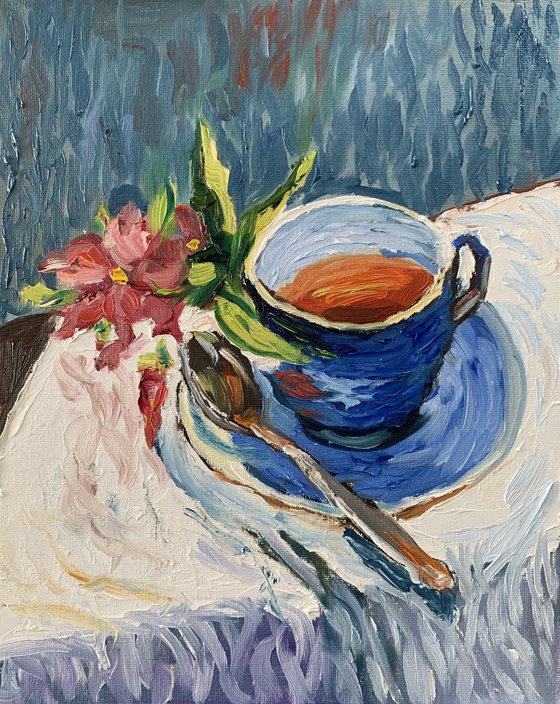 Tea cup with flowers.