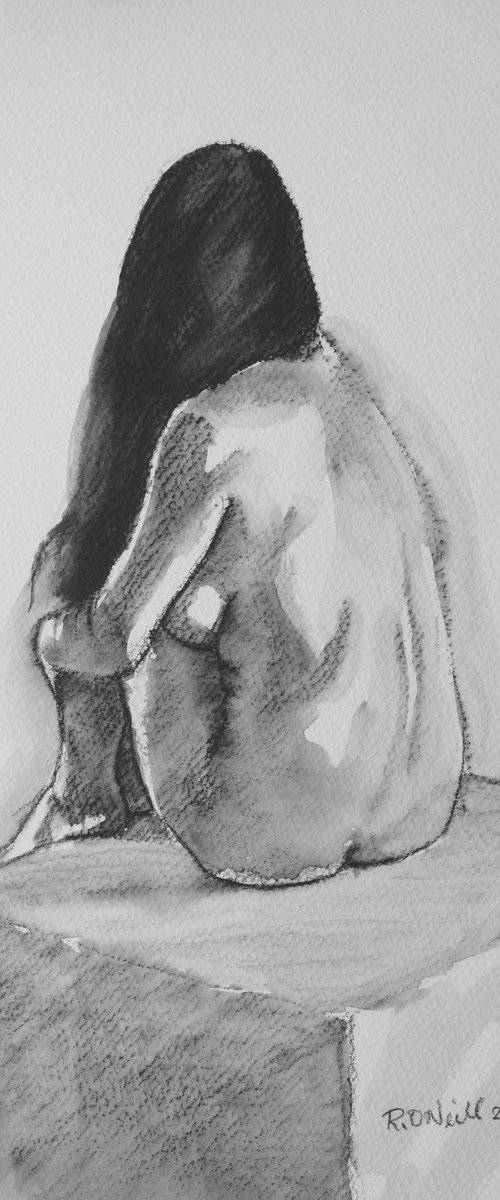 Seated female nude by Rory O’Neill