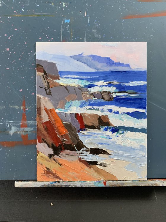Sea rocks and beach.
