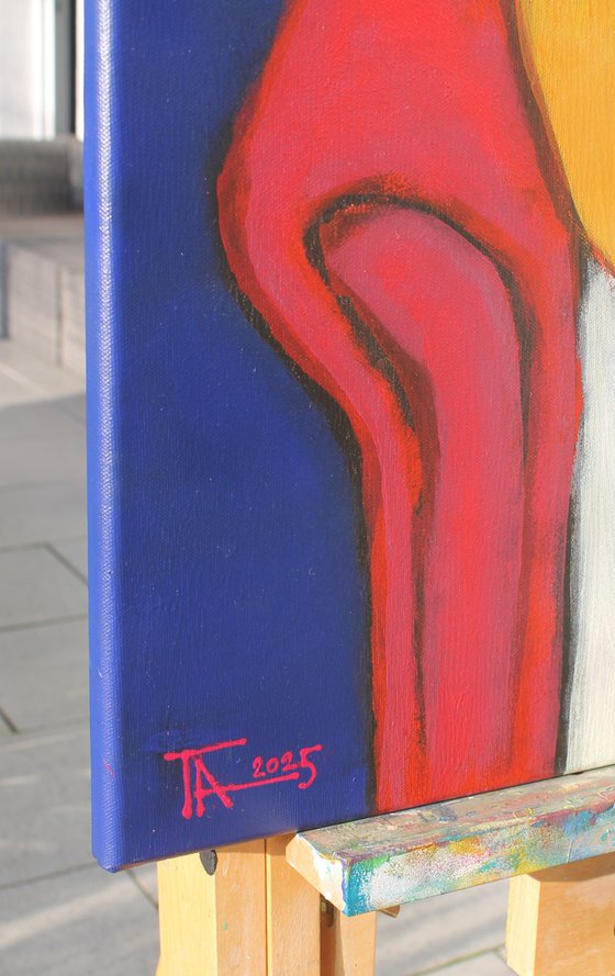 Portrait in a red chair.